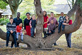 Large Family by Tree