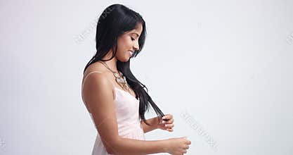 Beautiful Indian young woman in long pink dress