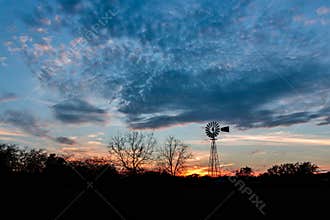 Sunset with a Windmill in Ingram Texas