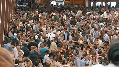 Celebration of Oktoberfest in large beer tent. Bavaria, Germany