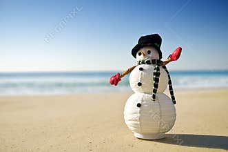 Snowman at the beach