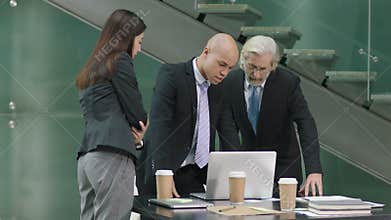 Corporate executives meeting in office in modern company