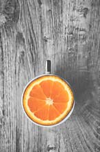 Top view of delicious sweet Orange in Cup isolated on a wooden b