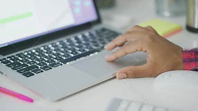 Anonymous woman using laptop