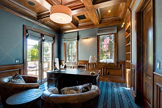 Spacious home office with wood ceiling