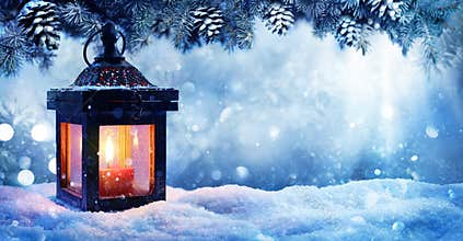 Christmas Lantern On Snow With Fir Branch