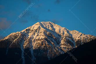 View of the peaks of the Rocky Mountains from Golden, BC, Canada