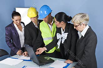 Architects team in office having a meeting