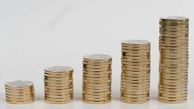 Columns of coins symbolizing the growth chart