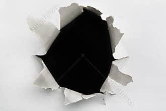 Empty hole on cracked wall