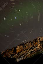 Star Trails around Polaris above a Sandstone Cliff