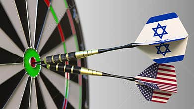 Flags of Israel and the USA on darts hitting bullseye of the target. International cooperation or competition conceptual