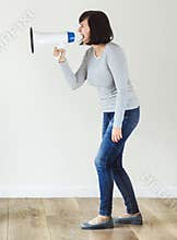 Woman using megaphone for announcement