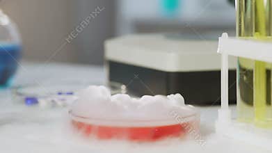 At laboratory, smoking chemistry glassware, biochemical experiment and science