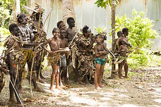 Indigenes - boys and young men - with bows, speers, Solomon Islands, South Pacific Ocean