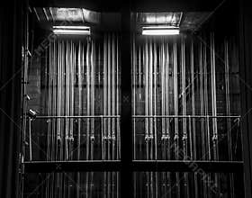 Cable and chain rigging backstage in a theater.