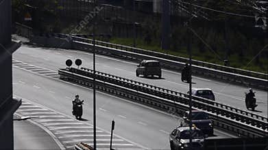 Traffic with auto, scooters and trucks