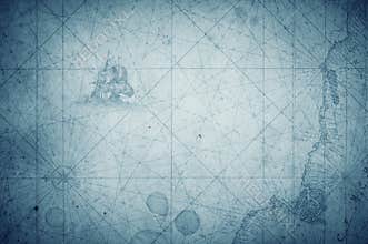 Old vintage retro compass on ancient map. Survival, exploration