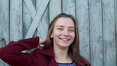 Attractive woman with dental braces smiling cheerfully