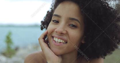 Pretty young woman in wind