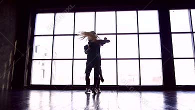 Professional couple of dancers studio. Brazilian zouk. A pair of dancers beautifully dance against the background of a