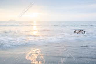 Beautiful gently waves, Traditional Thai fish trap in surf in th