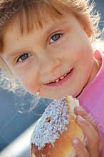 Child eating a bun