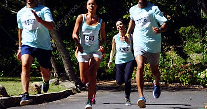 Marathon athletes running in the park 4k