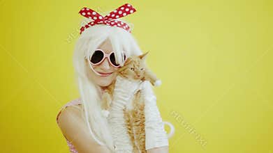 Blond girl with glasses in the image of anime doll