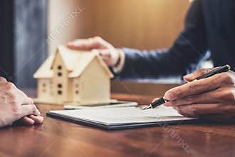 Real estate broker agent presenting and consult to customer to d
