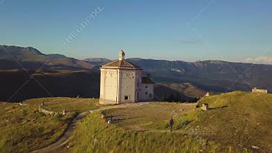 Stunning 4k fast aerial of countryside church in the Abruzzo valleys, Italy
