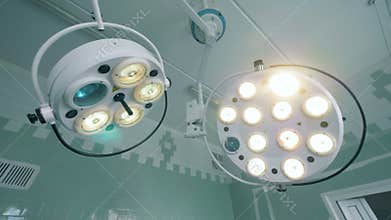 Medical lamps in a surgery room, close up. Medical facility.