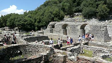 People visiting ruins of Buthrotum Albania of roman and venetian time. Archaeological park. Also known as Butrint and Butrinti.