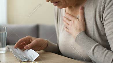 Old woman getting bad after reading pills instruction, dangerous side effects