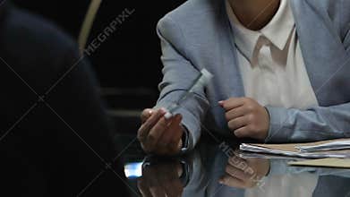 Cop showing to criminal victim photo and checking reaction, body language