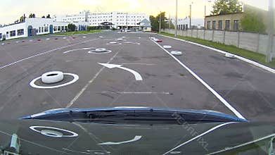 Motor show client conducting test drive of new car before buying, training