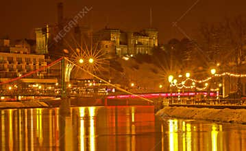 Inverness Castle and the River Ness at night.