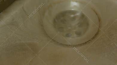 Dirty Water Confluence Into Sink