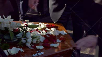 Funeral casket in a hearse or chapel or burial at cemetery