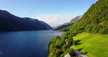 Sunny day view to fjord and water from drone on air Norway