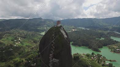 Backwards aerial drone view of La Piedra del PeÃ±ol in Colombia
