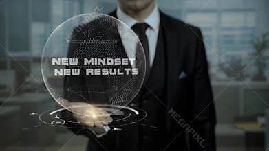 Startup management tutor presents concept New Mindset New Result using hologram.