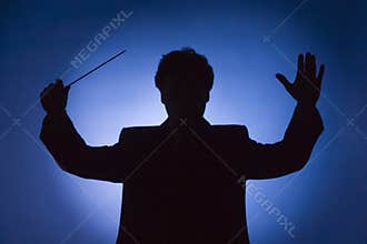 Silhouette of conductor