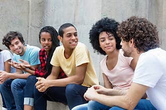 African american and latin young adults talking about politics