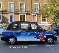 Classic London taxi with Aeroflot advertisement