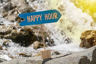 Happy hour board on rock