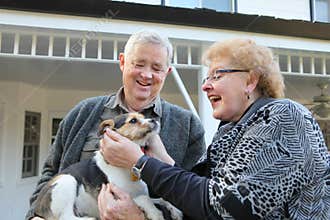 Elderly Couple with Dog