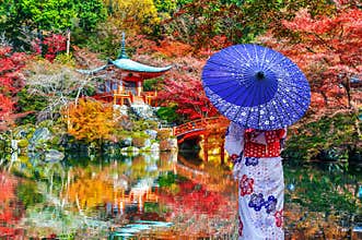 Asian woman wearing japanese traditional kimono in Daigoji temple, Kyoto. Japan autumn seasons
