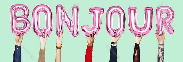 Hands holding Bounjour word in balloon letters