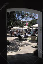 People eating outside on a sunny day, Santa Barbara, California